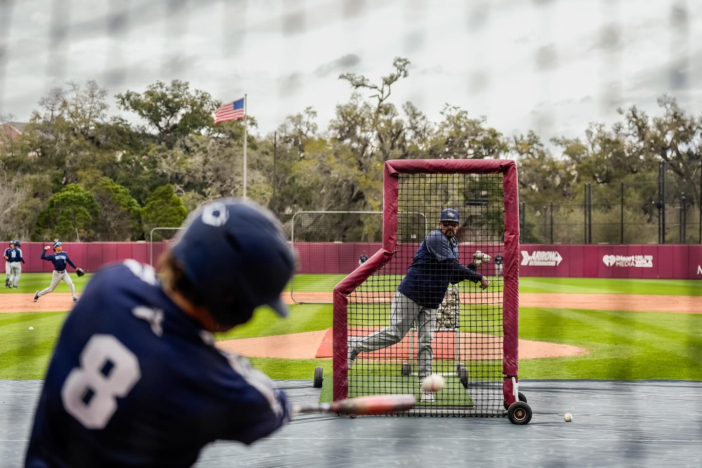 Player taking batting practice at UNF Baseball prospect camp in Florida